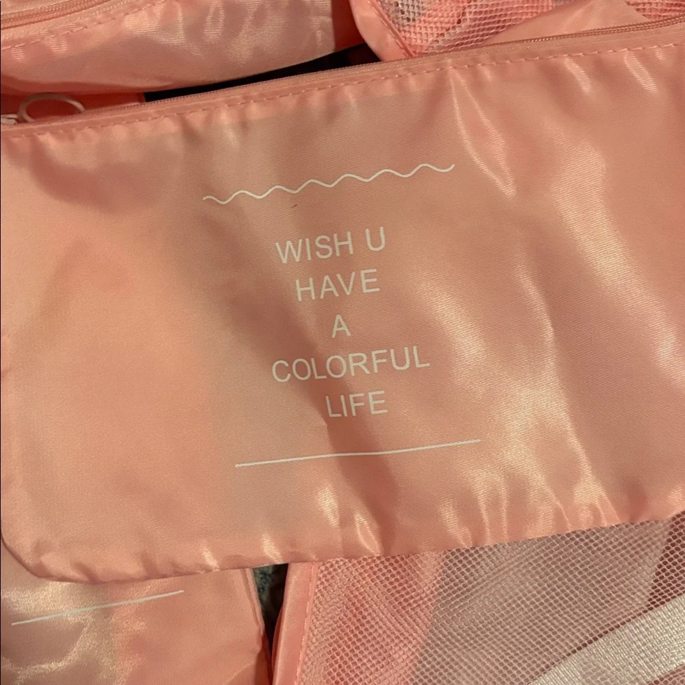 Pink Packing cubes . Set of 7 bags never used .